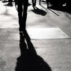 Walking down the street - Light and shadow photography